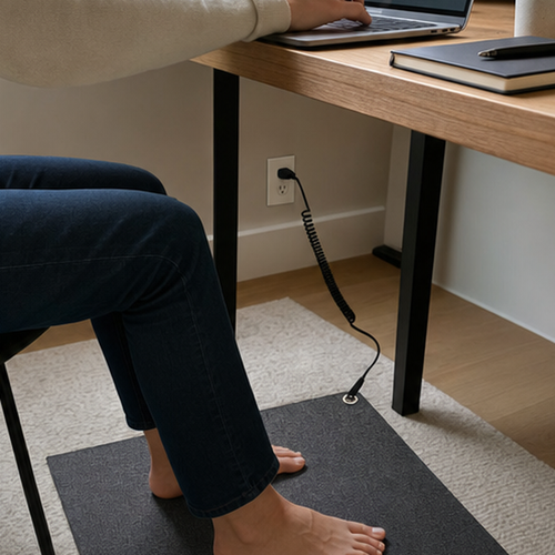 Under-Desk Earthing Pad in use at a desk